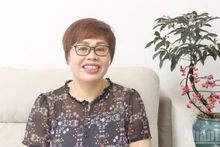La profesora Pān Jīn É, en una entrevista con un corresponsal del periódico Nhan Dan (Pueblo) en China.