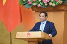 El primer ministro vietnamita, Pham Minh Chinh, habla en el evento. (Foto: VNA)