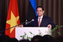 El primer ministro de Vietnam, Pham Minh Chinh, habla en el evento. (Foto: VNA)