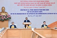 El primer ministro Pham Minh Chinh habla en la reunión. (Foto: Nhan Dan)