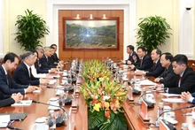 [Foto] Jefe de la Comisión de Propaganda y Movilización de Masas del Partido Comunista de Vietnam recibe a su homólogo de China