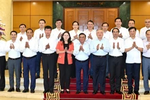 [Foto] Buró Político trabaja con Junta Permanente de Comité del Partido de provincia de Lao Cai