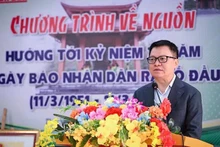 El presidente-editor del periódico Nhan Dan, Le Quoc Minh, habla en la cita. 