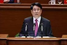 El miembro del Buró Político y presidente de la República, Luong Cuong, pronuncia el discurso de apertura del XIV Congreso Nacional del Partido Comunista de Vietnam. (Foto: VNA)