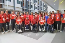 Funcionarios del Ministerio de Cultura, Deportes y Turismo visitan y alientan a la delegación vietnamita en los Asean Para Games 13 en Tailandia. (Foto: VNA)