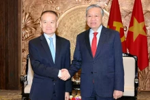 [Foto] Líder partidista de Vietnam recibe a enviado especial del máximo dirigente chino