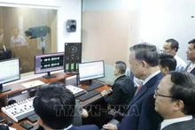 [Foto] Secretario general To Lam visita Voz de Vietnam por Año Nuevo Lunar 