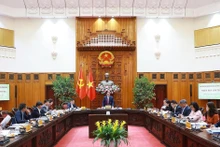 El primer ministro de Vietnam, Pham Minh Chinh, en su calidad de jefe del Comité Directivo Nacional para la Inclusión Financiera, preside la tercera reunión del organismo. (Foto: VNA)