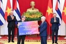 [Foto] Dirigentes partidistas de Vietnam y Cuba presencian intercambio de firmas de documentos de cooperación binacional
