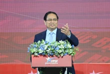 El primer ministro Pham Minh Chinh habla en el evento. (Foto: Nhan Dan)