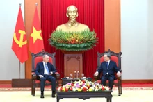 El secretario general del PCV, To Lam, conversa con Nikolai Patrushev, asistente del presidente ruso y jefe del Consejo Marítimo de la Federación de Rusia. (Foto: Nhan Dan)