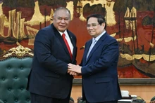 El primer ministro de Vietnam, Pham Minh Chinh, y el ministro de Relaciones Exteriores y Cooperación de Timor Oriental, Bendito dos Santos Freitas. (Foto: Nhan Dan)