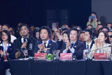 Delegados en la sesión de diálogo de alto nivel del Foro del Sector Privado de Vietnam. (Foto: VNA)