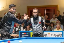 Tran Quyet Chien (derecha) y Nguyen Tran Thanh Tu, campeones mundiales por equipos en 2026. (Foto: UMB).