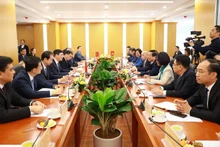 La reunión entre el Ministerio de Construcción de Vietnam y representantes de a Región Autónoma Zhuang de Guangxi (China). (Foto: Ministerio de Construcción)