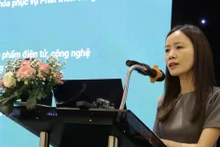 Le Thi Mai Anh, representante del Ministerio de Industria y Comercio, habla en el evento. (Foto: VNA)