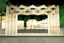 Perspectiva de la puerta de bienvenida de la Exposición “Acción por la Comunidad 2025”. 