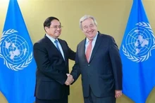 El primer ministro Pham Minh Chinh (izq) y el secretario general de la ONU, António Guterres. (Foto: VNA)
