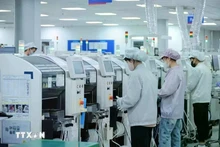 Empresas de IED invierten en moderna cadena de fabricación. (Foto: VNA)