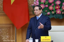 El primer ministro de Vietnam, Pham Minh Chinh, se reúne en Hanói con una delegación de 37 empresas japonesas. (Foto: VNA)