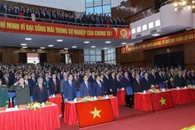 Foto: Ceremonia de saludo a la bandera nacional en la inauguración de la XIX Asamblea del Comité del PCV en la provincia de Thanh Hoa.