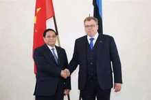 El primer ministro de Vietnam, Pham Minh Chinh, y el presidente de la Asamblea Estatal (Parlamento) de Estonia, Lauri Hussar. (Foto: VNA)