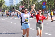 Atletas extranjeras participan con entusiasmo en el evento. (Foto: VNA)