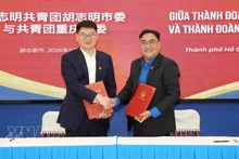 Firma del memorando de entendimiento entre las organizaciones juveniles de Ciudad Ho Chi Minh y de Chongqing (China) (Foto: VNA)
