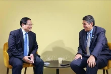 El primer ministro de Vietnam, Pham Minh Chinh (izquierda) y el presidente de Palaos, Surangel Whipps Jr. (Foto: VNA)