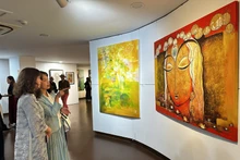 Visitantes en el evento. (Foto: VNA)