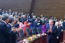 El secretario general del PCV, To Lam, asiste a la ceremonia de anuncio de la Resolución sobre la reorganización administrativa en Ciudad Ho Chi Minh. (Foto: Thong Nhat / VNA)