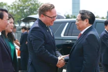 Ceremonia de despedida del primer ministro Pham Minh Chinh y de la delegación de alto nivel de Vietnam en el Aeropuerto Internacional de Noi Bai, en Hanói. (Foto: Duong Giang/VNA)