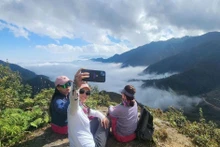 Visitantes en Mu Cang Chai. (Foto: VNA)