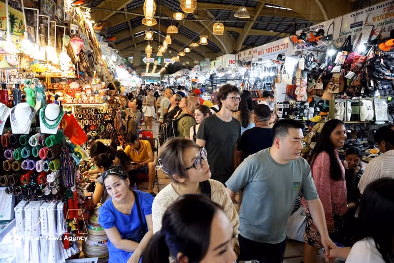 Turistas en Ciudad Ho Chi Minh. (Foto: VNA)