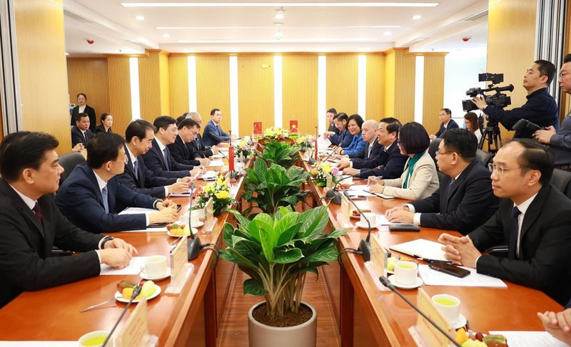 La reunión entre el Ministerio de Construcción de Vietnam y representantes de a Región Autónoma Zhuang de Guangxi (China). (Foto: Ministerio de Construcción)