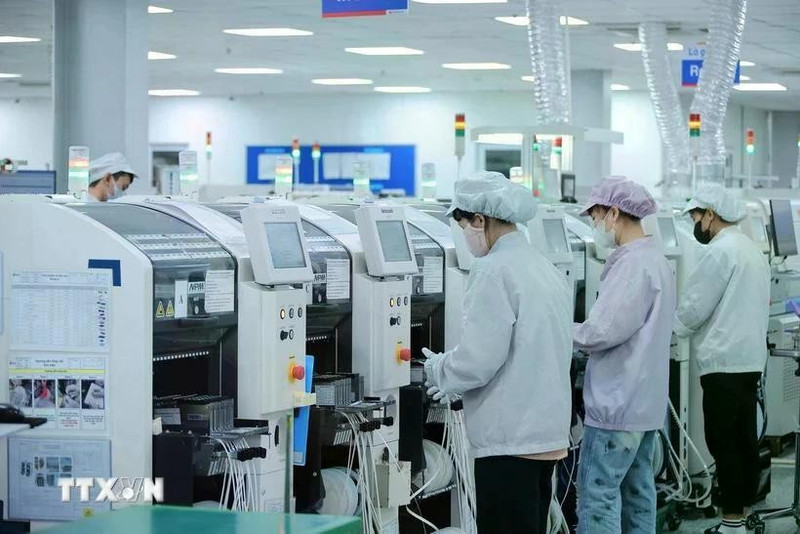 Empresas de IED invierten en moderna cadena de fabricación. (Foto: VNA)