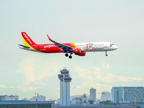 El avión de Vietjet llevando símbolo turístico de Ciudad Ho Chi Minh (Fotografía: VNA)