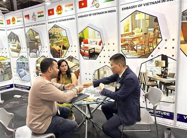 En el stand de Vietnam en la exposición (Foto: VNA)