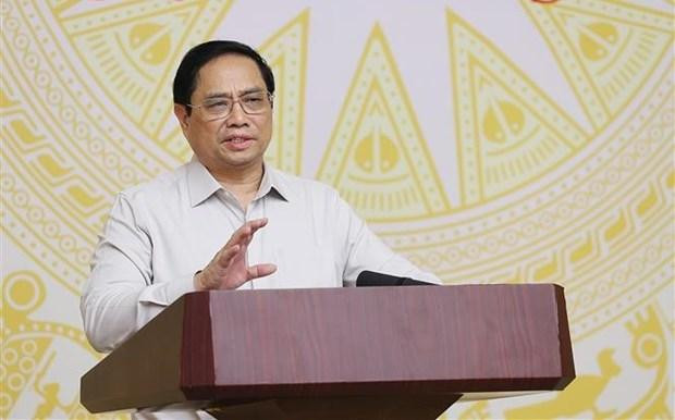 El primer ministro de Vietnam, Pham Minh Chinh, habla en la teleconferencia. (Fotografía: VNA)