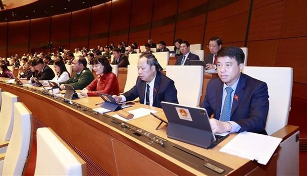 Diputados participantes en la reunión extraordinaria del Parlamento vietnamita (Fotografía: VNA)