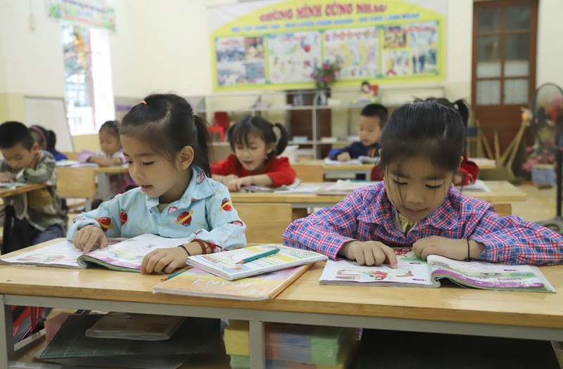 Una clase de alumnos en la escuela primaria de Nga My.