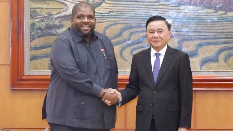 Ambos dirigentes en el evento (Foto: VNA)