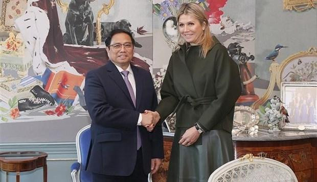 El primer ministro de Vietnam, Pham Minh Chinh, y la reina de Países Bajos, Máxima (Fotografía: VNA)
