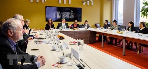 Escena de la reunión (Fotografía: VNA)