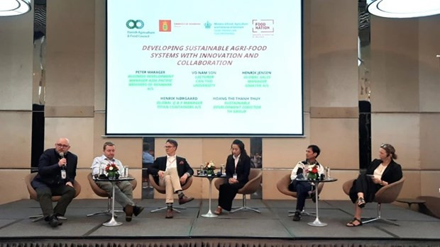 Delegados en el seminario sobre la cooperación Vietnam-Dinamarca en agricultura verde.