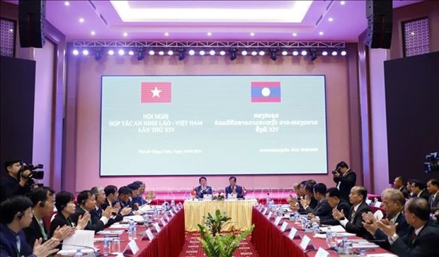 Vietnam y Laos fomentan cooperación en seguridad | Nhan Dan Online