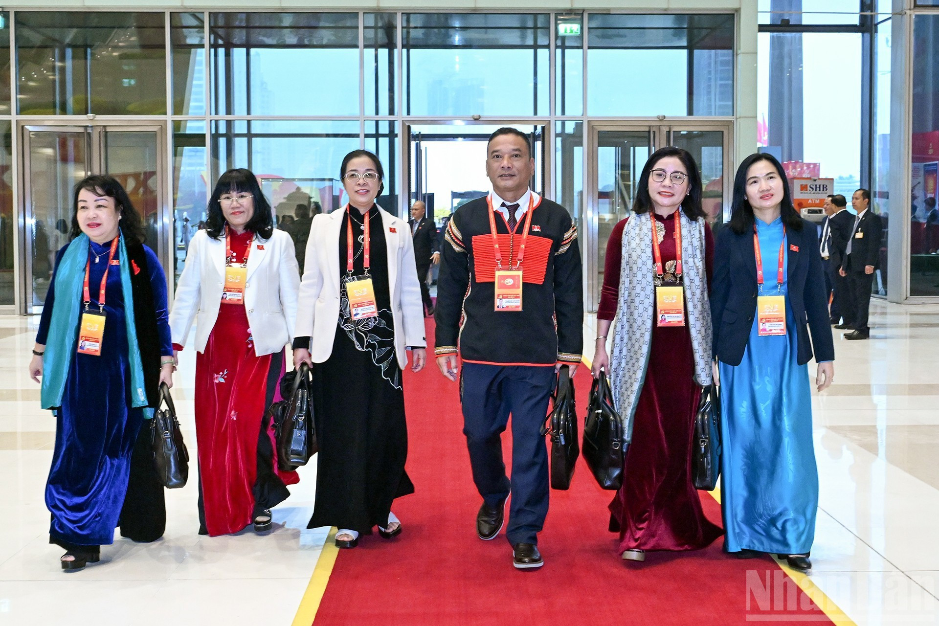 Delegados del XIV Congreso Nacional del Partido acuden al Centro Nacional de Convenciones.