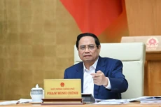 El primer ministro Pham Minh Chinh interviene en la reunión. (Foto: VNA)