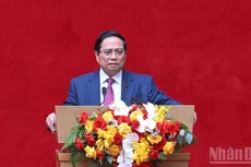 El primer ministro de Vietnam, Pham Minh Chinh, habla en la conferencia. (Foto: Nhan Dan)