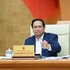 El primer ministro Pham Minh Chinh interviene en la reunión. (Foto: VNA)